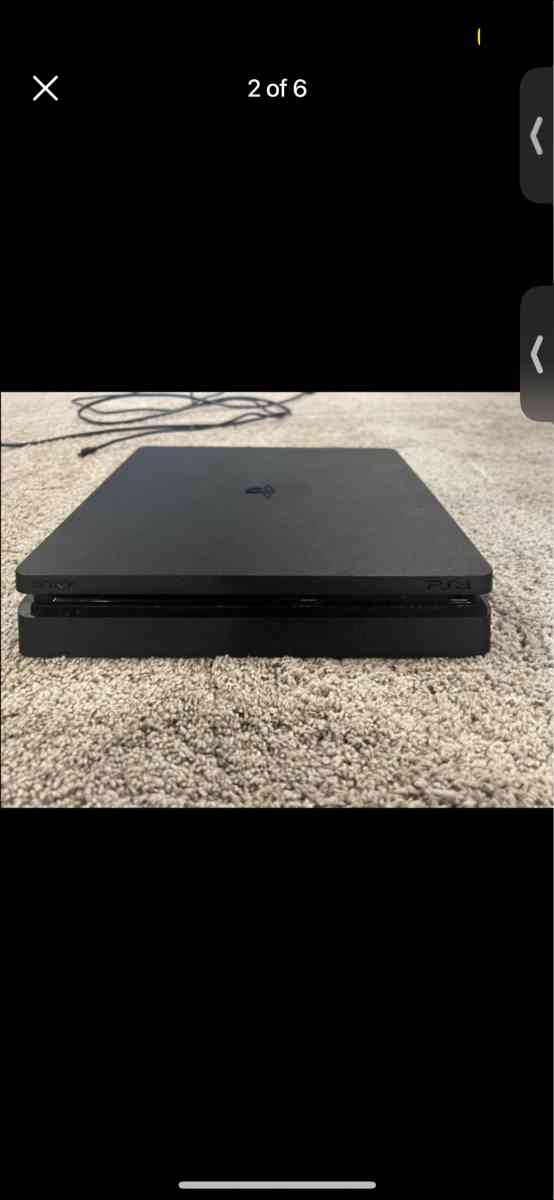 PlayStation 4 Slim 500 GB with blue controller and 5 games