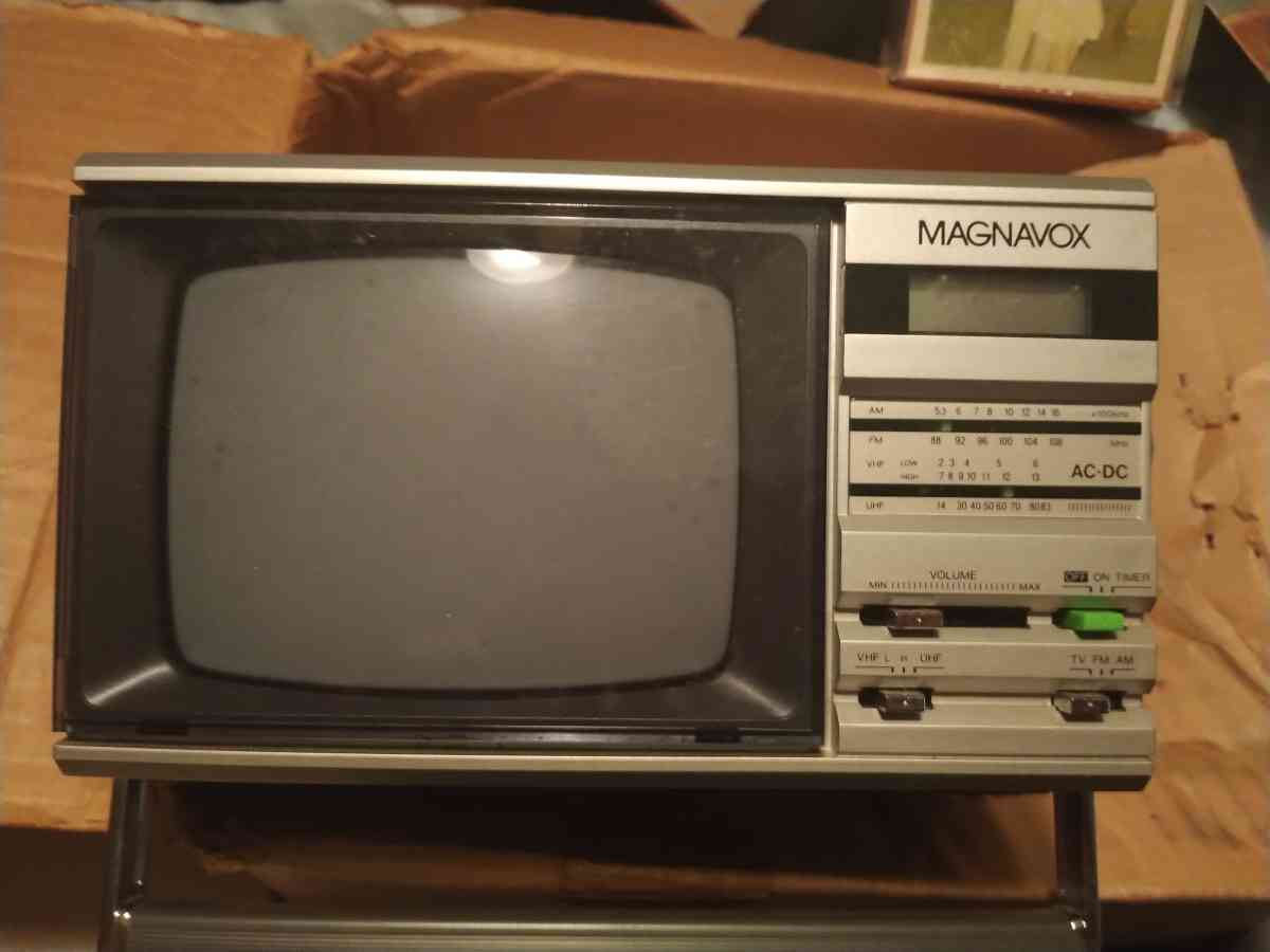 vintage but new never used portable Magnavox TV with cord