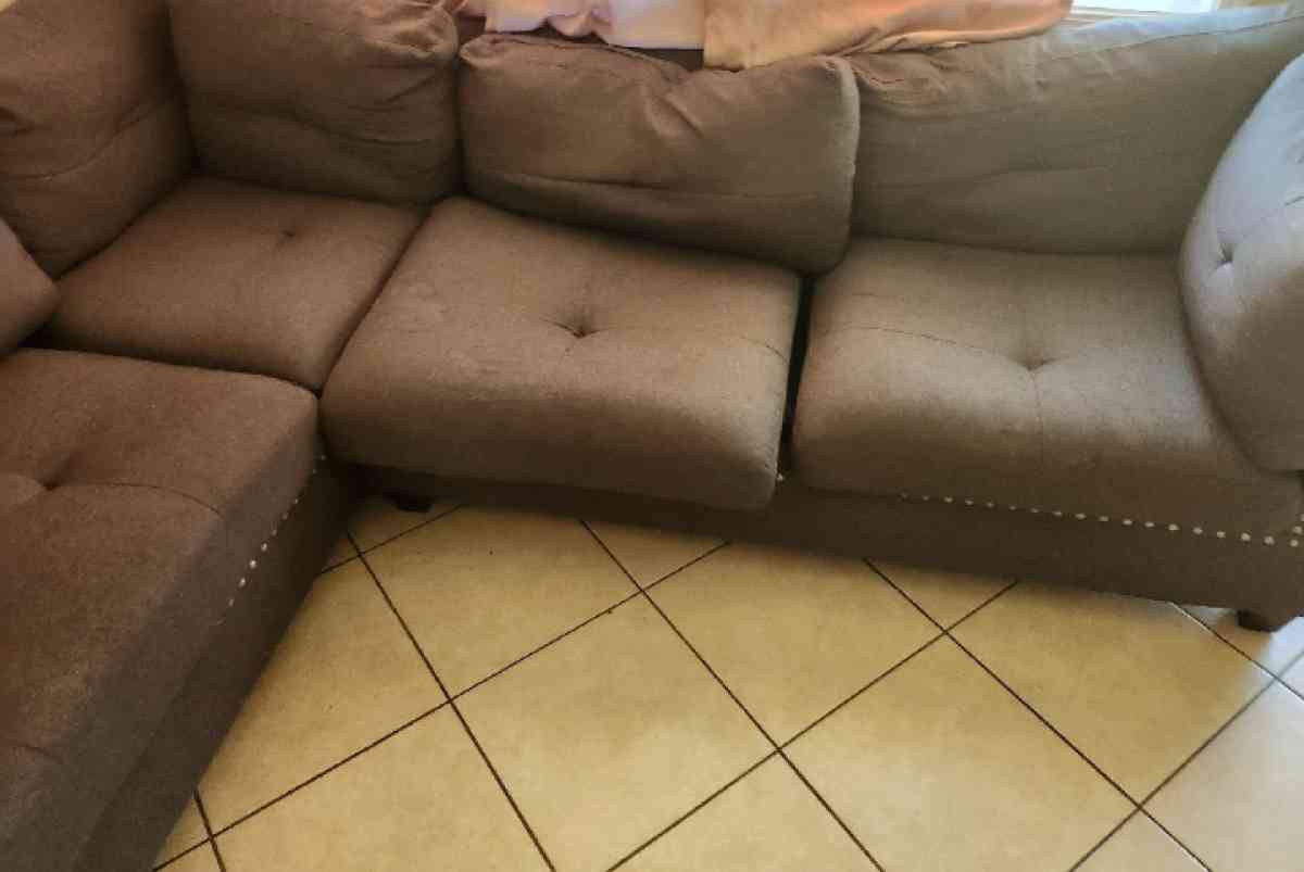 Grey sectional sofa with ottoman