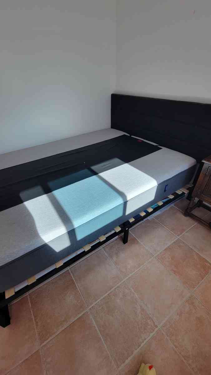 Queen memory foam mattress with a bed frame