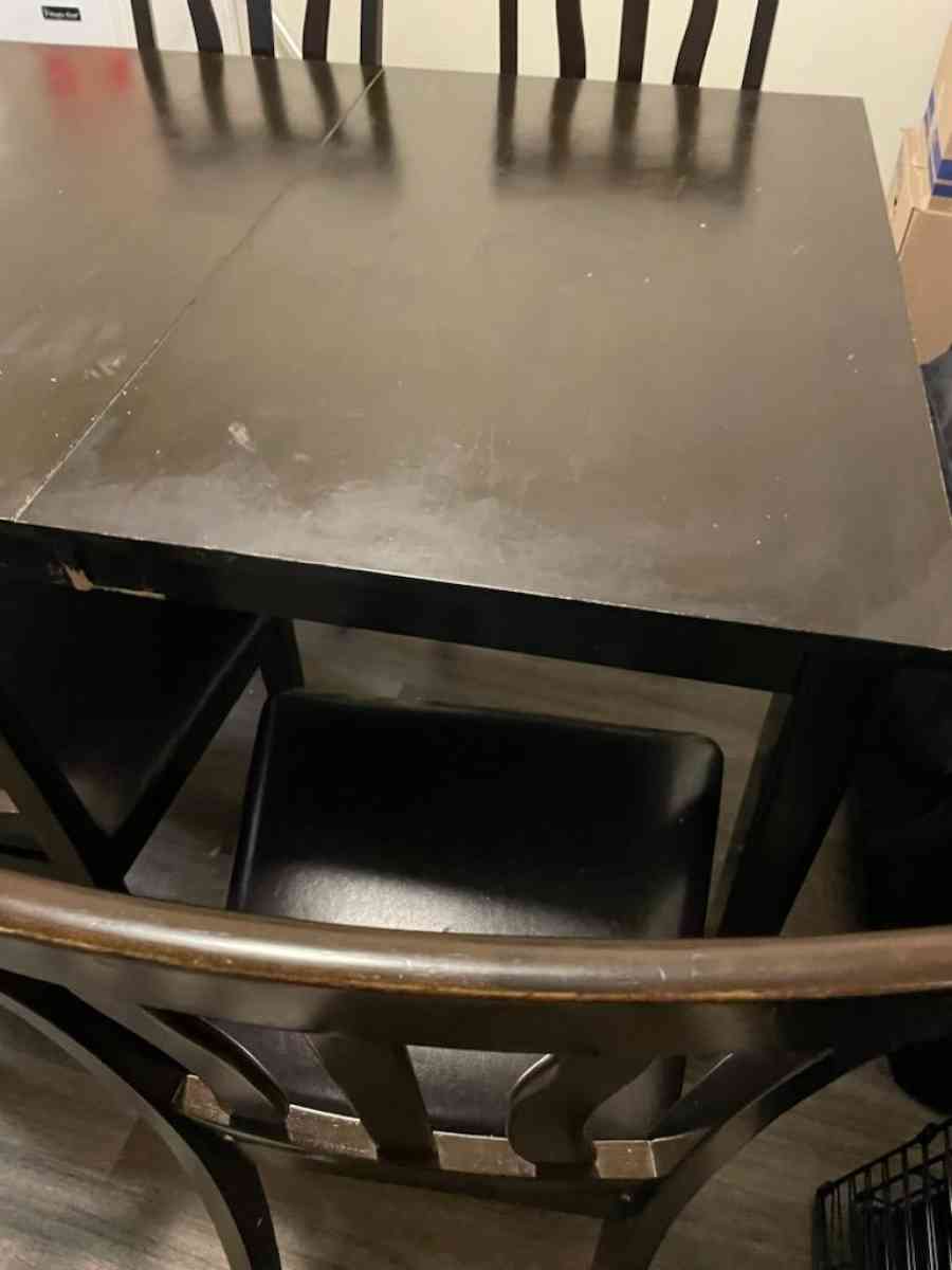 Table includes 5 chairs