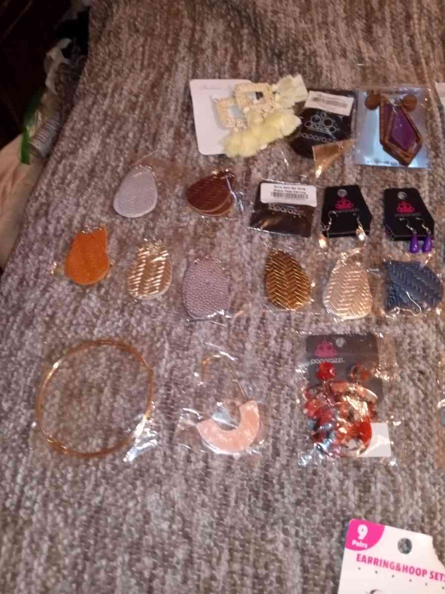 62 pairs of various brands of earrings they are all NIP