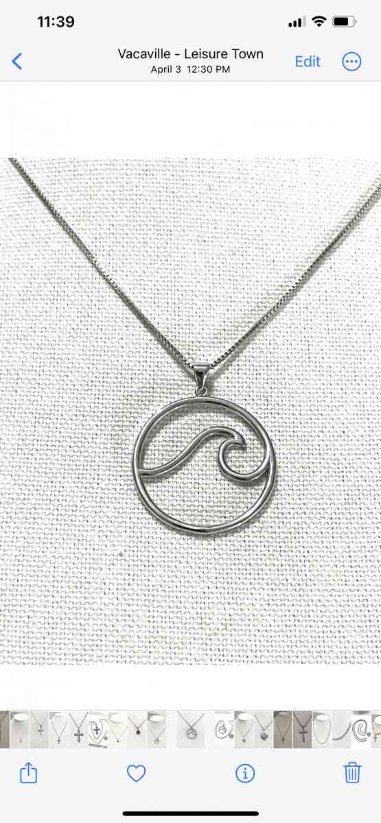 brand new silver pendant and necklace