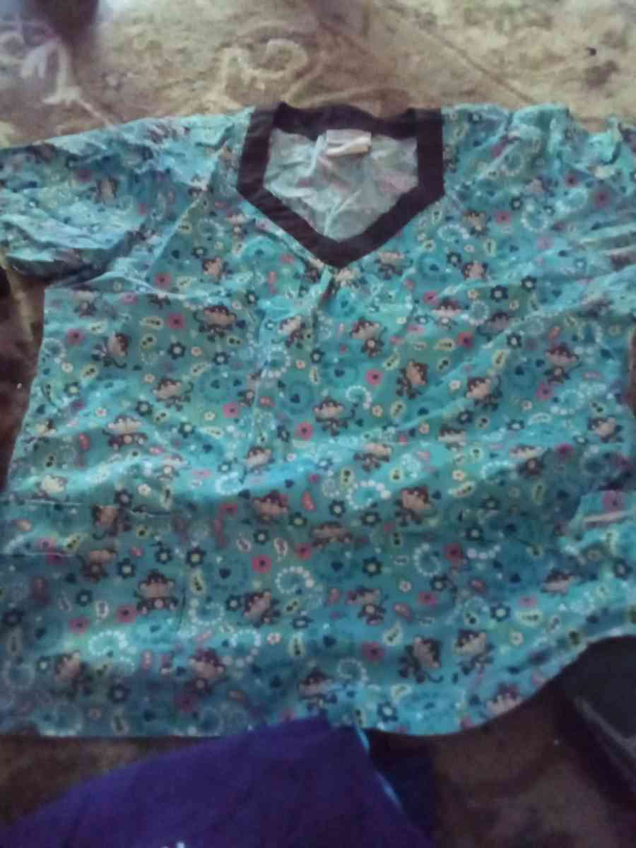 2 bags nice scrubs Dickies pirates of Caribbean Mickey mouse