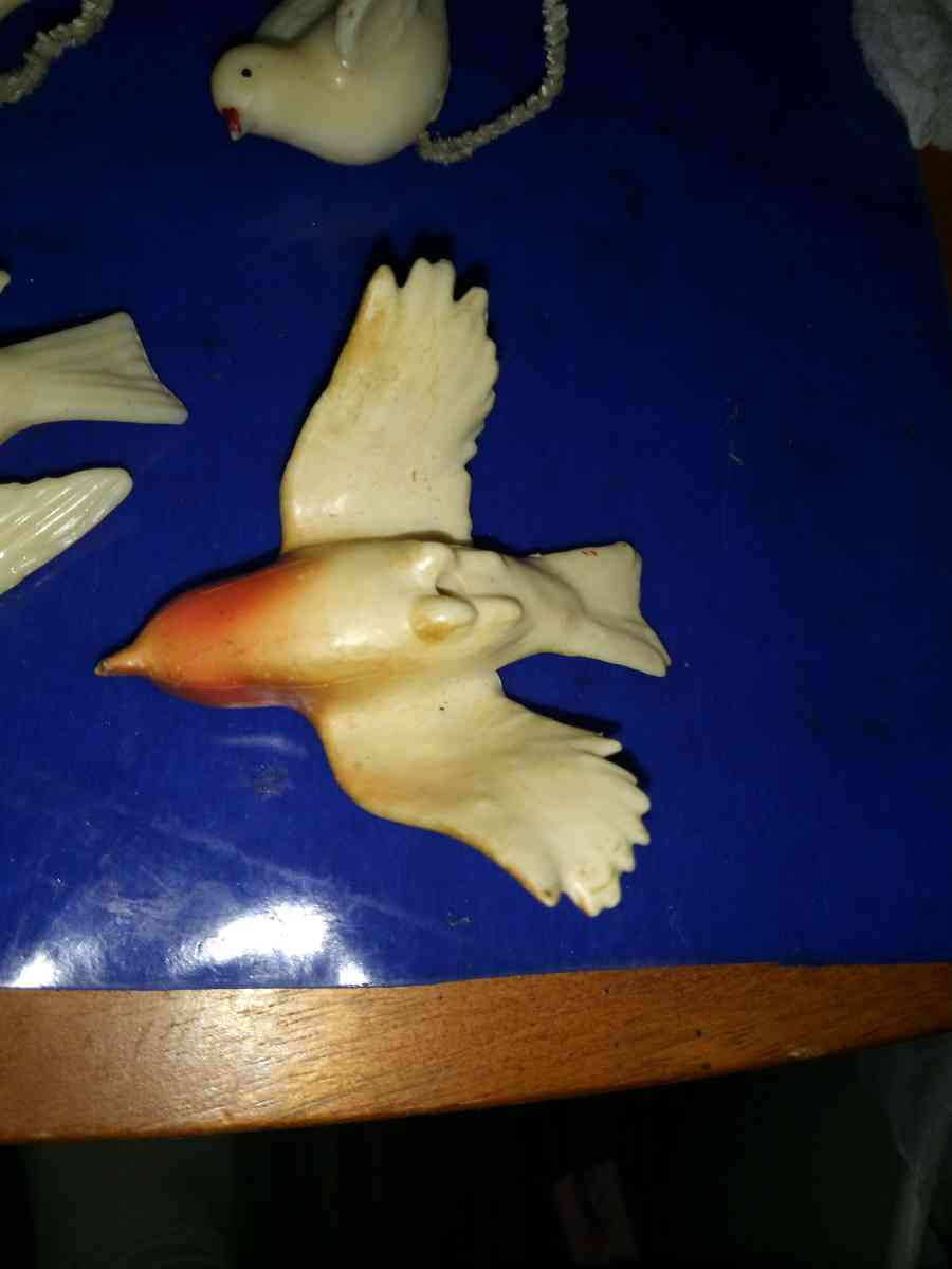 3 white and 1 airbrushed Lucite Birds