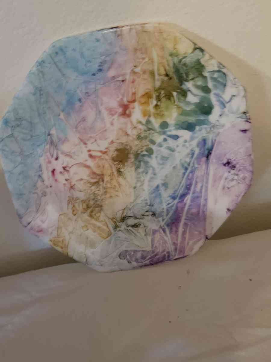 handpainted glass items and wood and stone sculptures