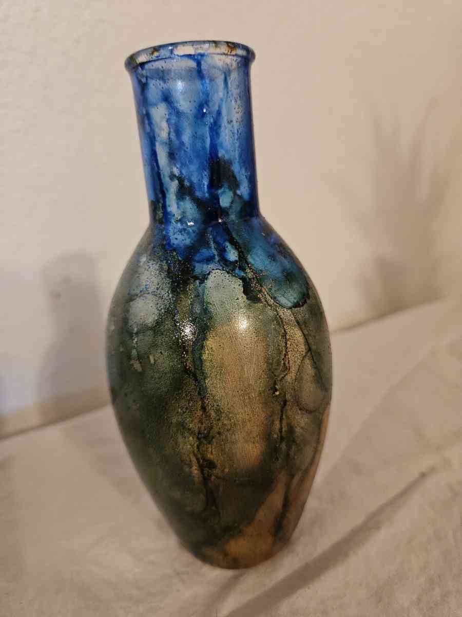 handpainted glass items and wood and stone sculptures