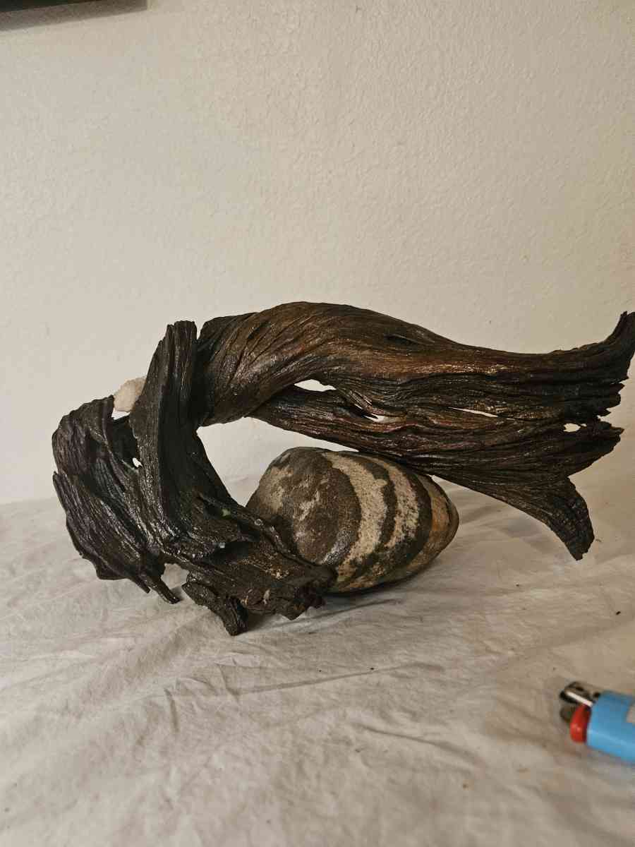 handpainted glass items and wood and stone sculptures