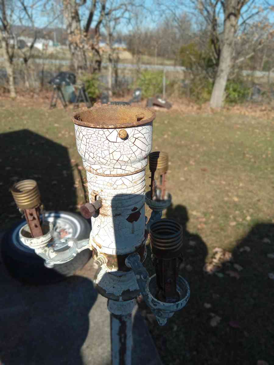 antique floor lamp marble base has brass on it