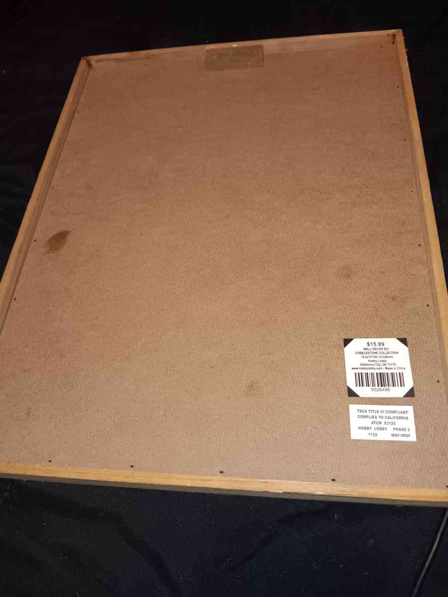 Wooden doorway framed painting