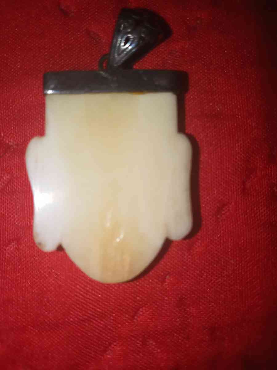 hand carved Buddha head pendant