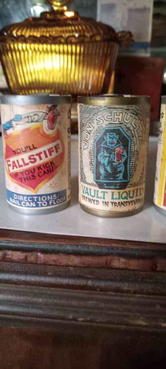 6 vintage mini beer cans