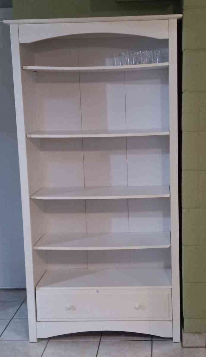 Two white bookshelves