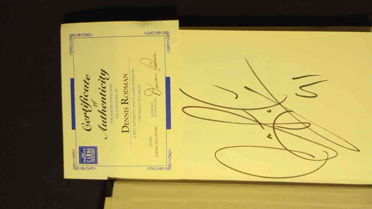 Autographed Signed with a picture of the book signing with C