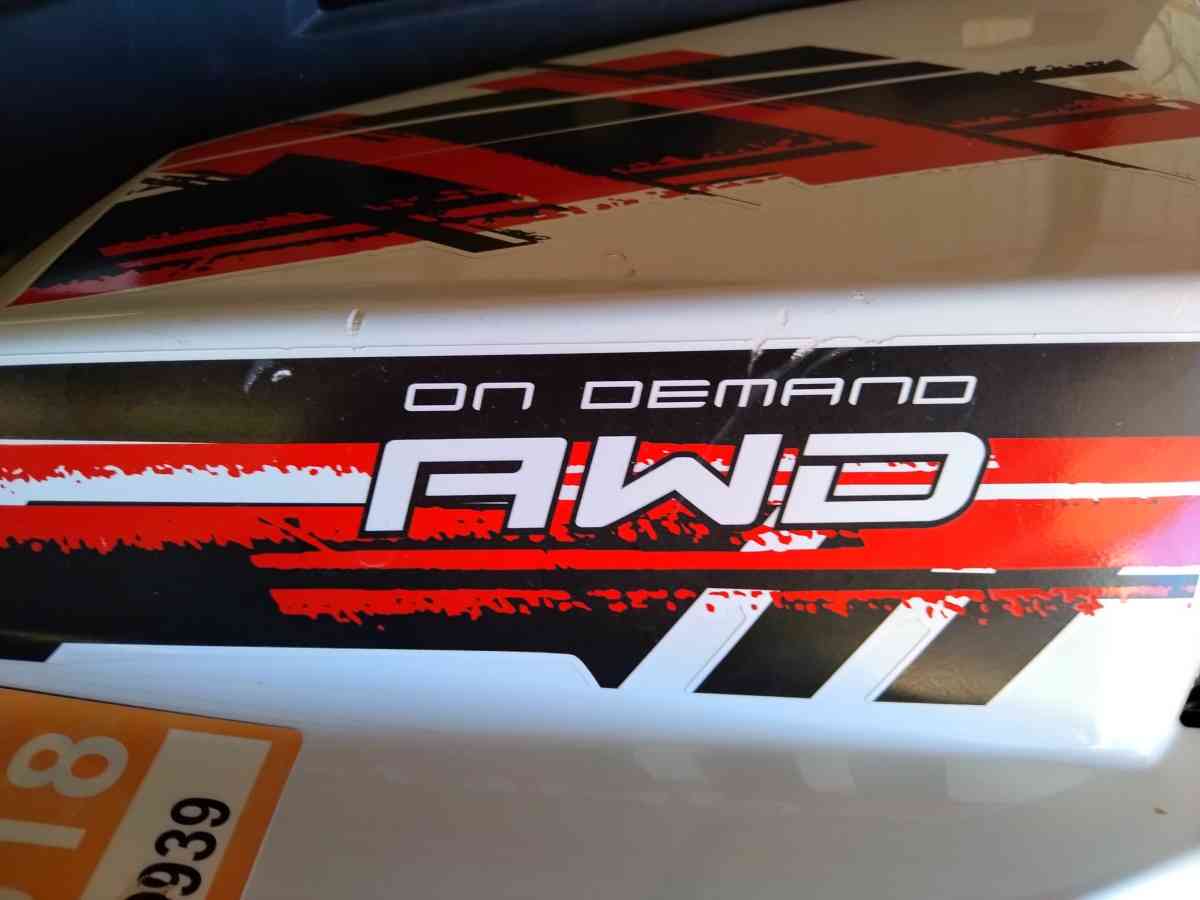 A 2016 Polaris On Demand All Wheel Drive Scrambler Xp 1000