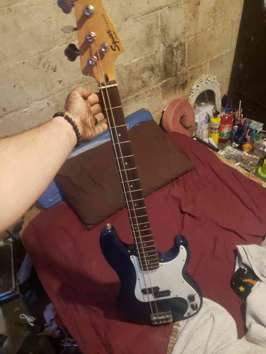 Squire electric bass guitar