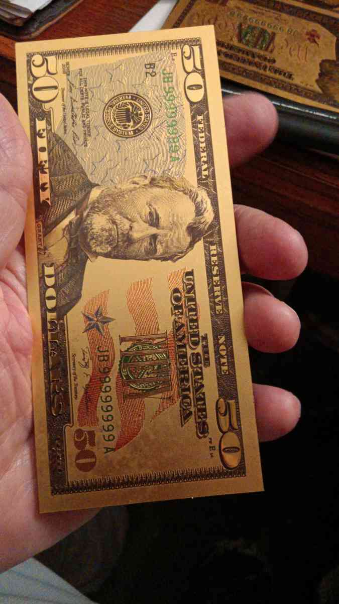 Set of Seven Commemorative Golden Bills covered with gold