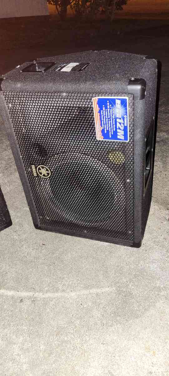 a Yamaha synthesizer and stage snake and speakers