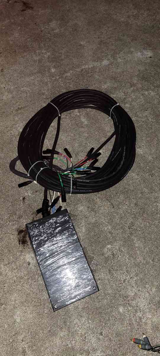 a Yamaha synthesizer and stage snake and speakers