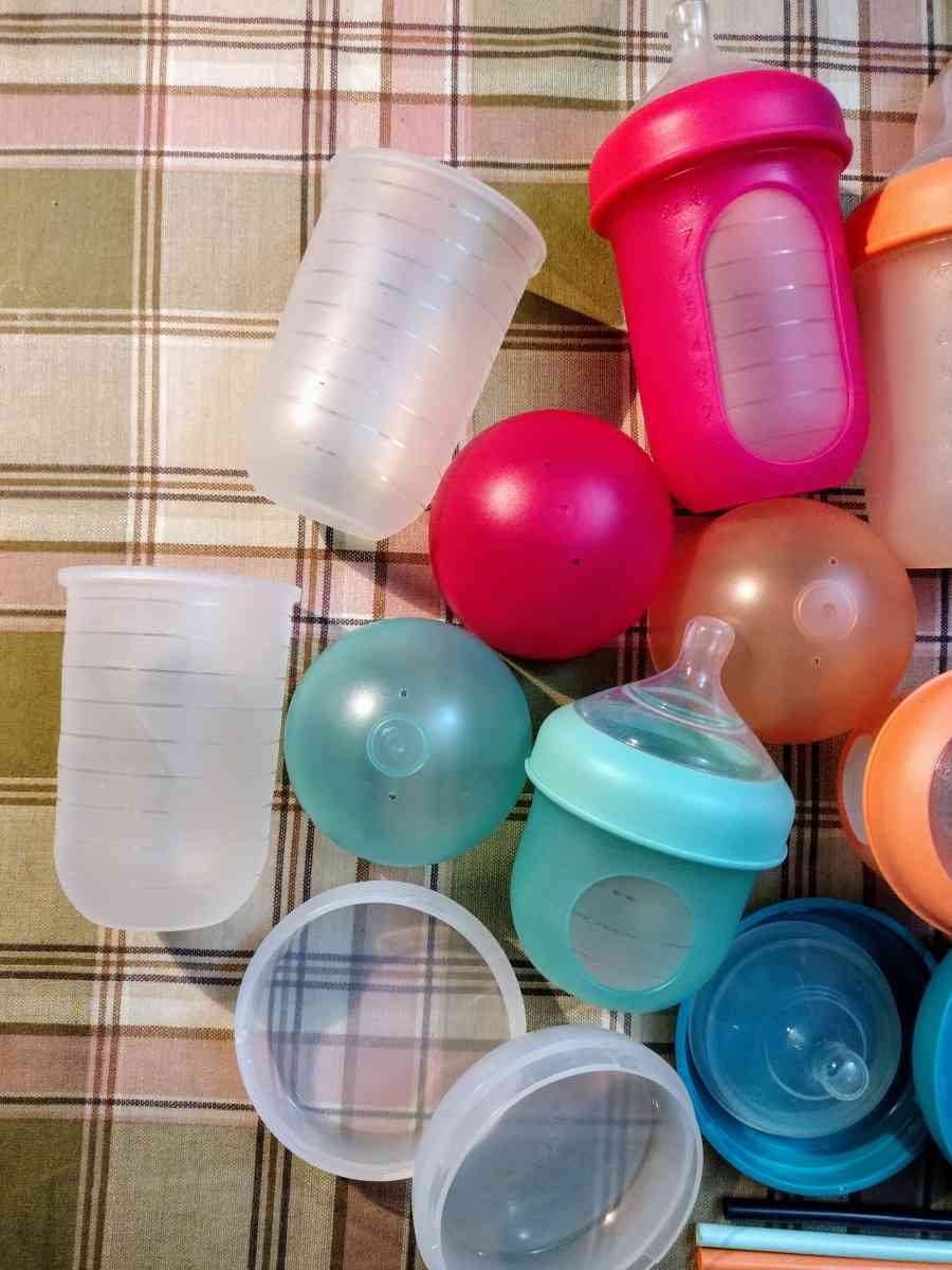Interchangeable Boon Nursh baby bottles and sippy cup access