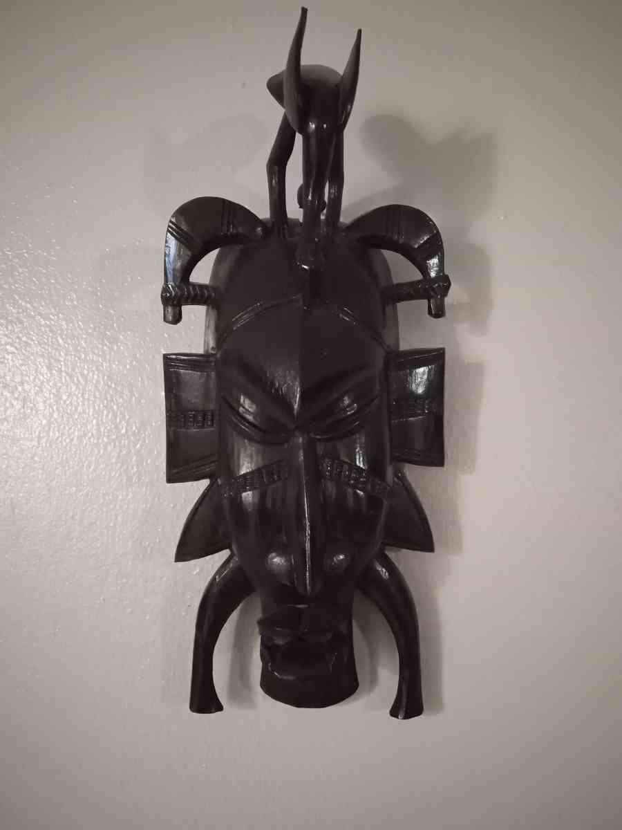 West African wood curved Female Statue