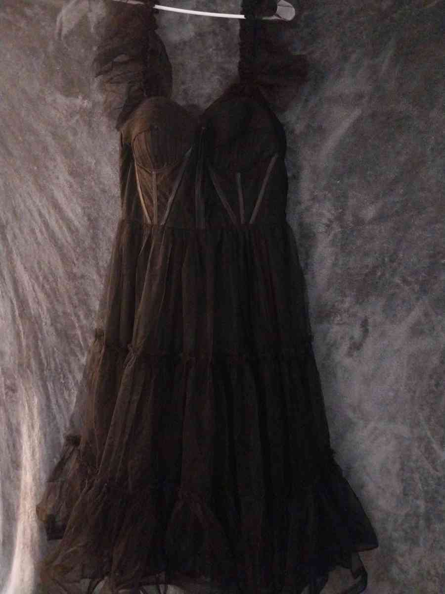 Corset style Corset is see thru around the bust