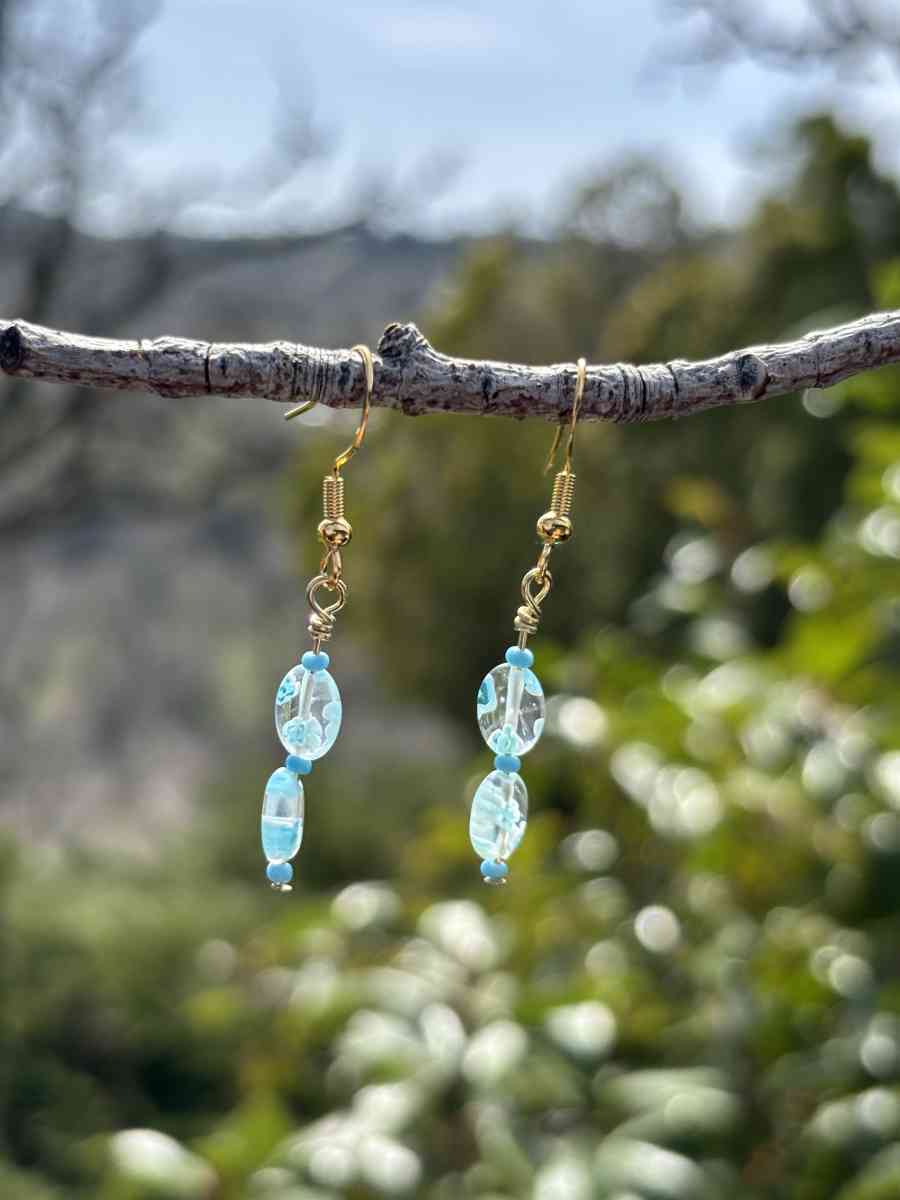 handmade glass blue beaded earrings with little blue flowers