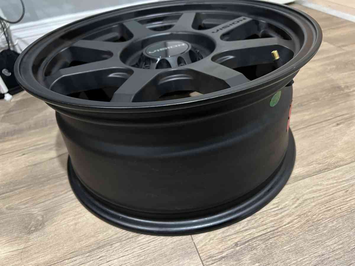 4 new identical matte black Vision rims