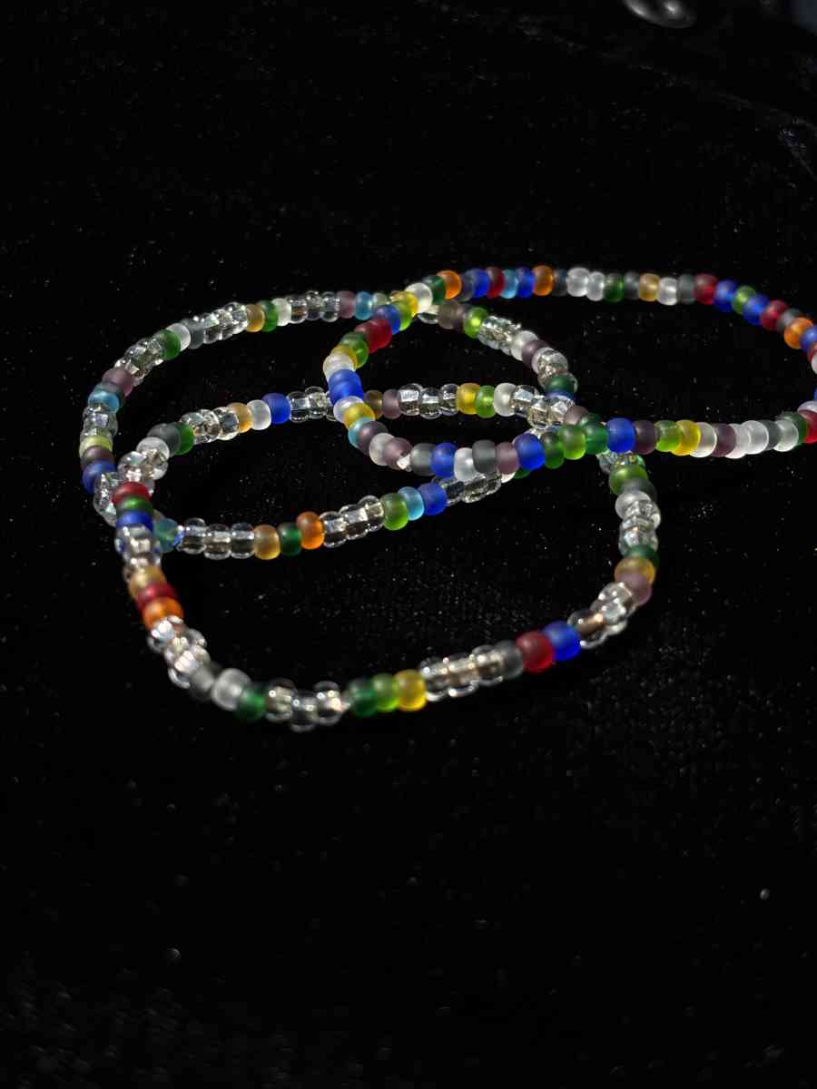 Set of 3 elastic rainbow and clear beaded bracelets