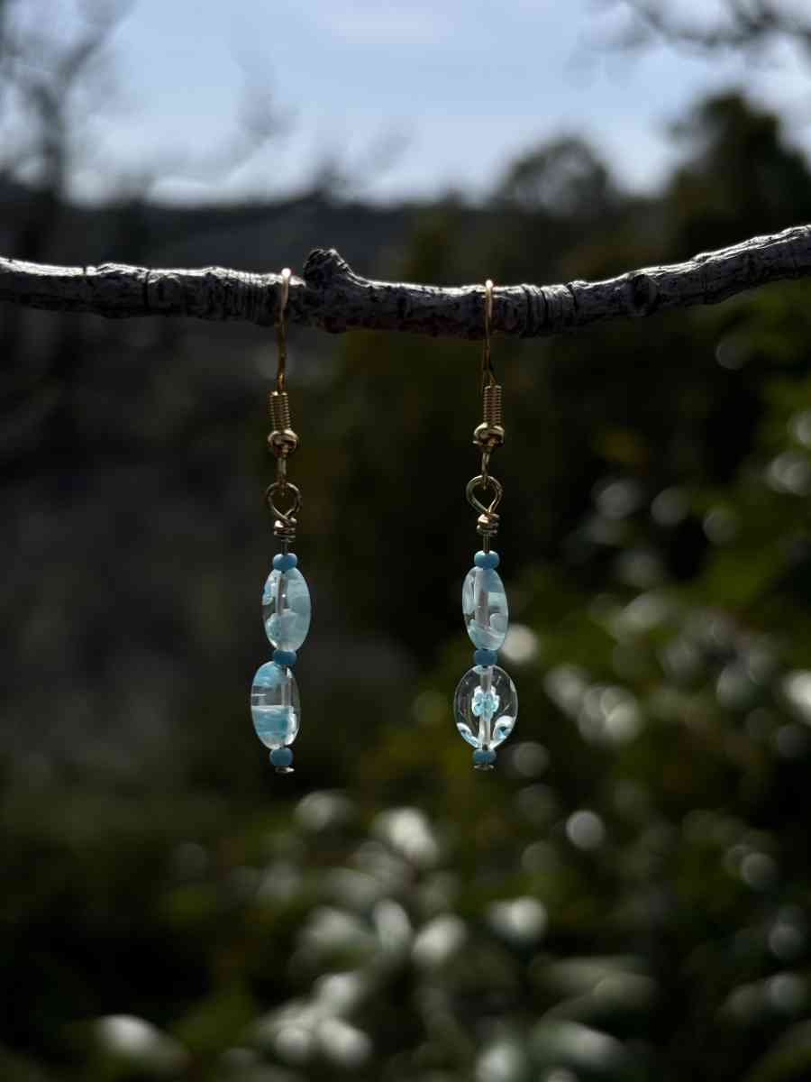handmade glass blue beaded earrings with little blue flowers