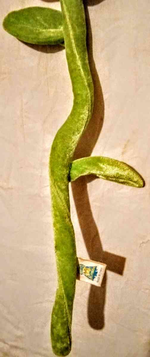 Orange Flower with Yellow Smiley Face and Green Bendable Ste