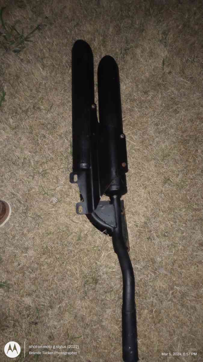 Black Straight Dual Exhaust for a motorcycle