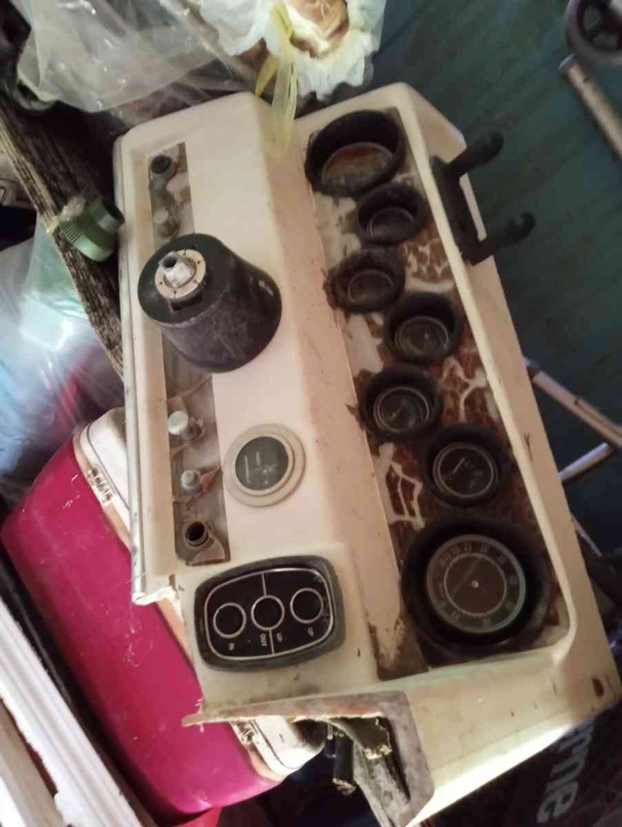 old boat parts and fishing poles and tackle