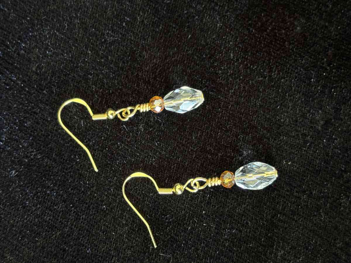 ambler and clear glass bead dangly earrings
