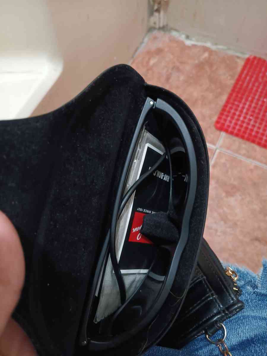 ray bans glasses and a old nintendo gameboy