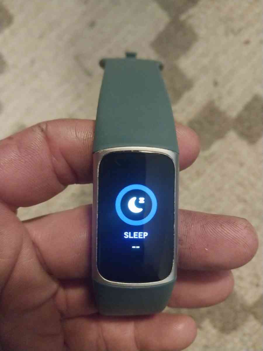 Brand New Fitbit Change 5 smartwatch with a extra