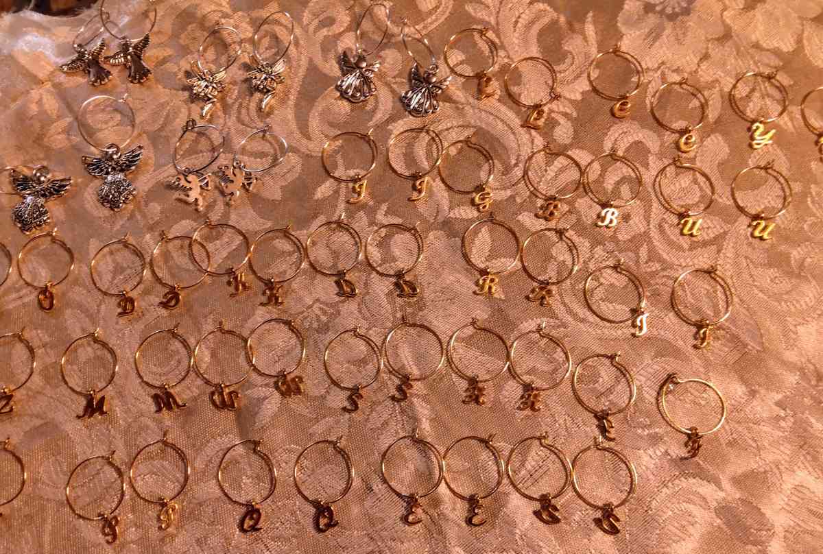 CLOTHES NECKLACES EARRINGS BRACELETS AND CHARM BRACELETS