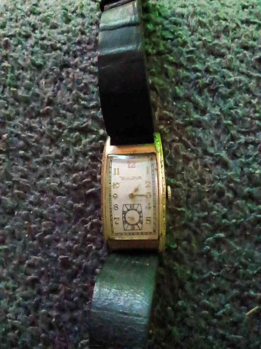 Dolls and Ventage bulova watch