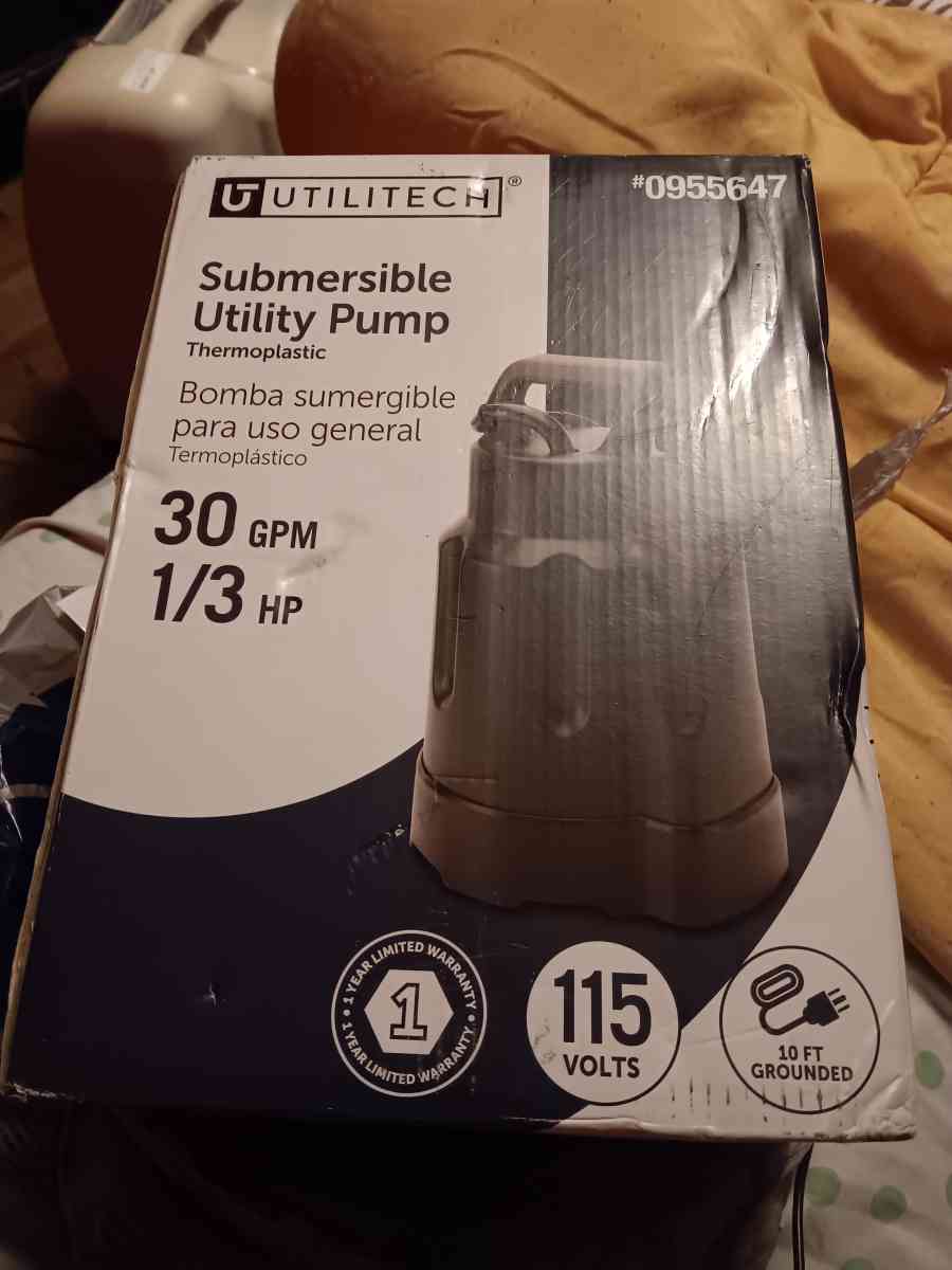 submersible  utility pump  30 gpm one third Hp brand new sti