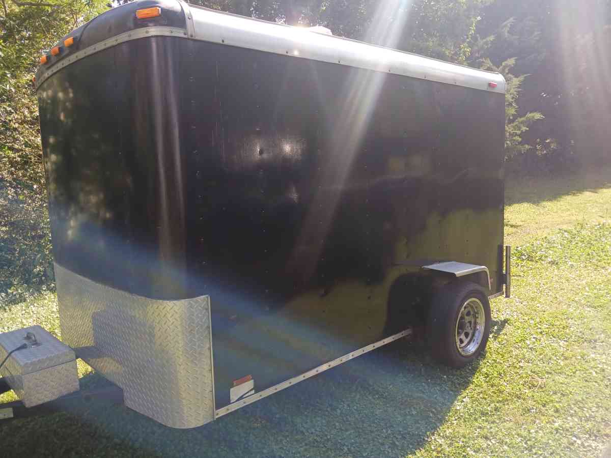 motorcycle trailer with 4 tracks in the floor spare tire