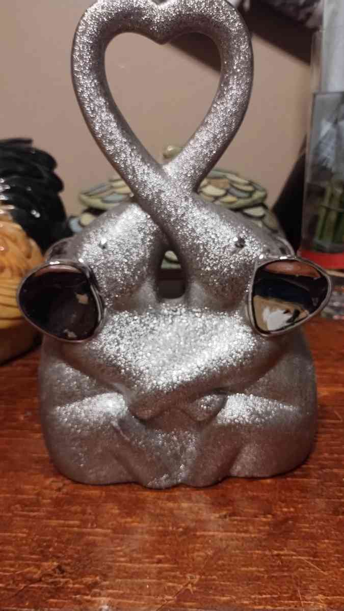 silver praying hands forever elephant