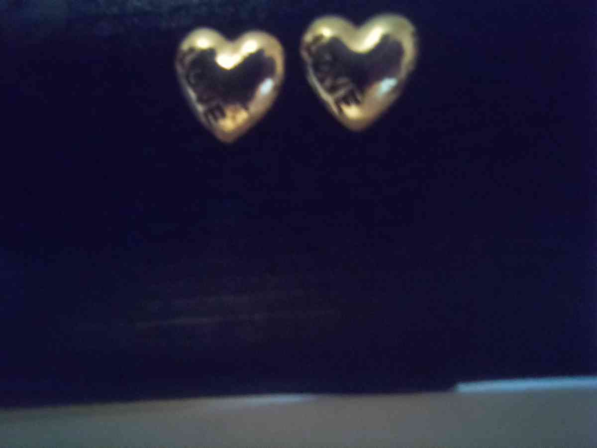 eartshape gold earrings with love written inside