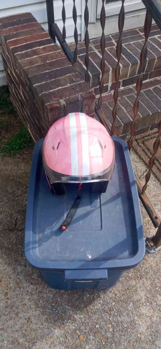 a pink DOT motorcycle helmet