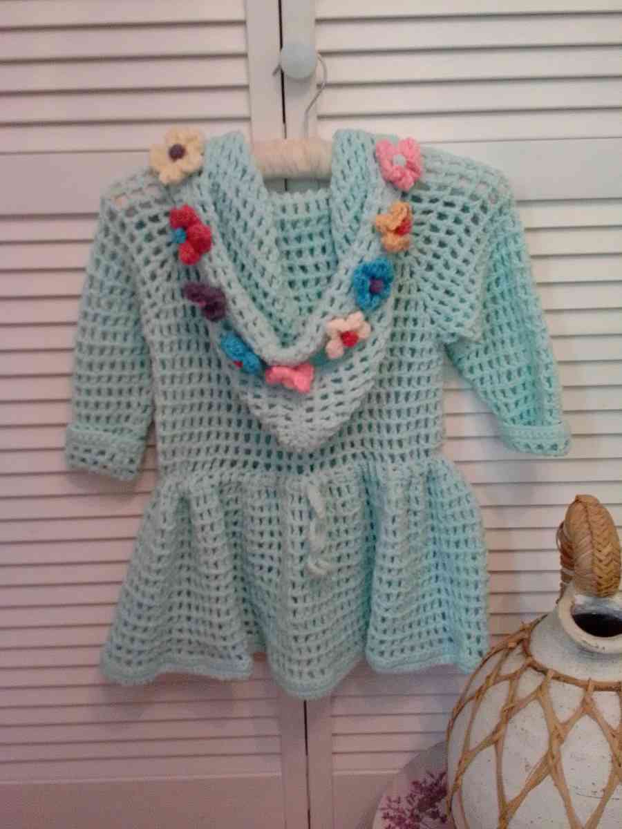 crocheted hoodie with puff flowers and heart wood buttons