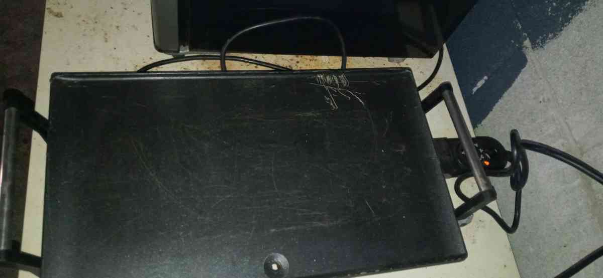 two pot plug in stove top and a flat skillet