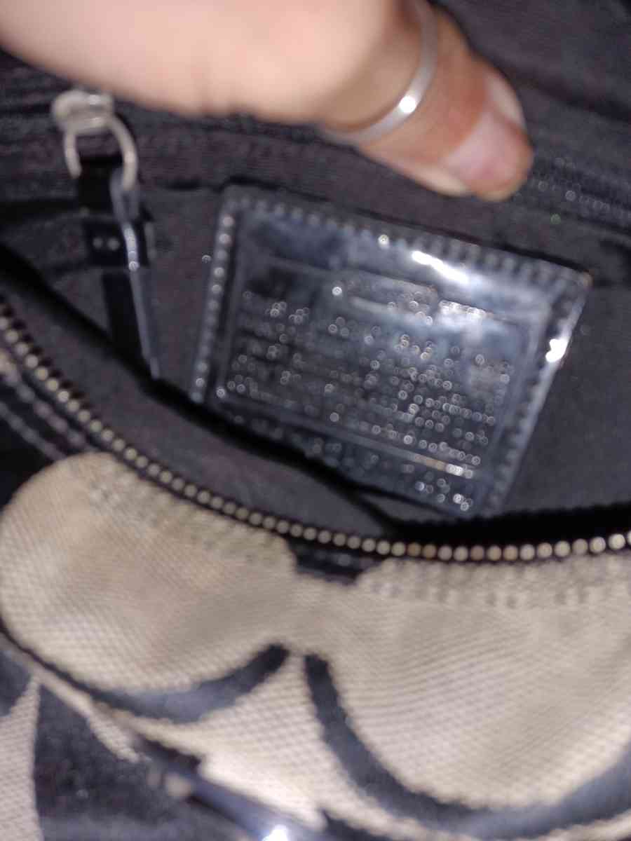 Coach beige and black canvas with leather trim