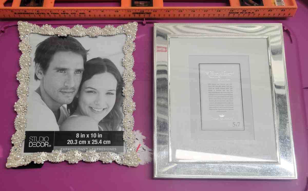 2  8x10 Photo Frames 1 Pearl and Embellished 1 Silver Mirror