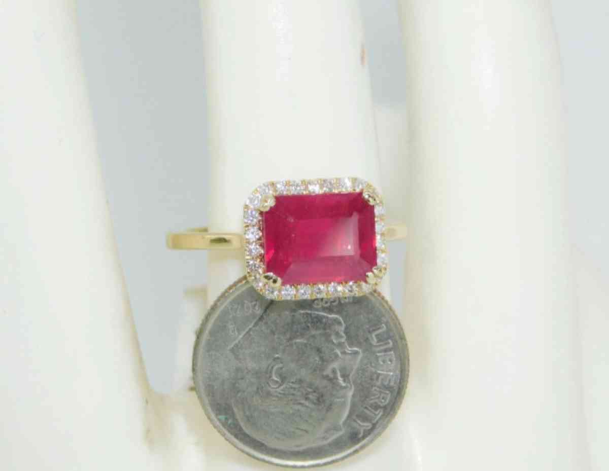 14k Gold Rudy  and diamonds   ring