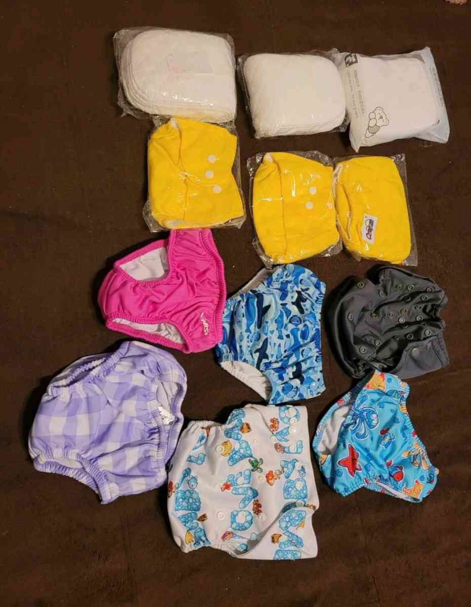 NEW 9 WASHABLE DIAPERS AND 30 PADS