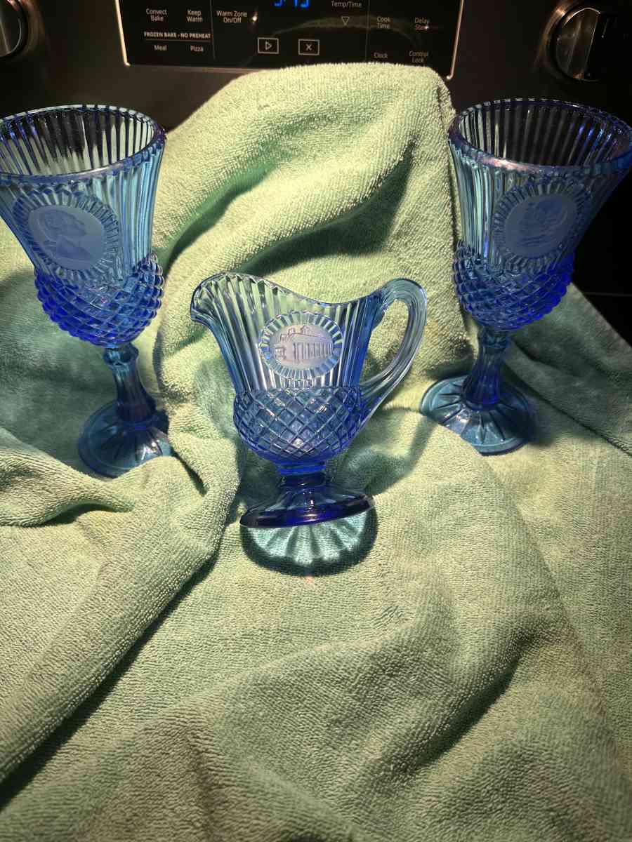 blue glass goblets and pitcher